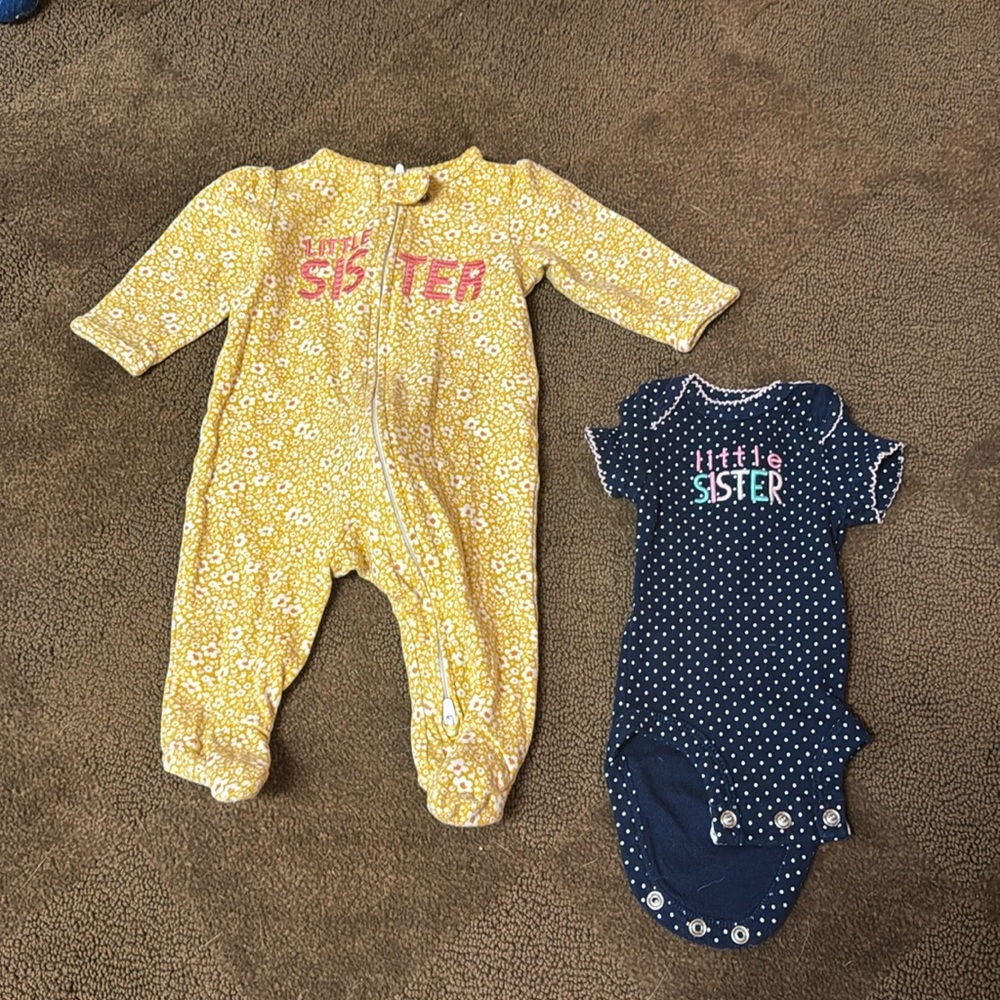 0-3 sleeper, rarely used. Blue premie, never used. Both are Carters